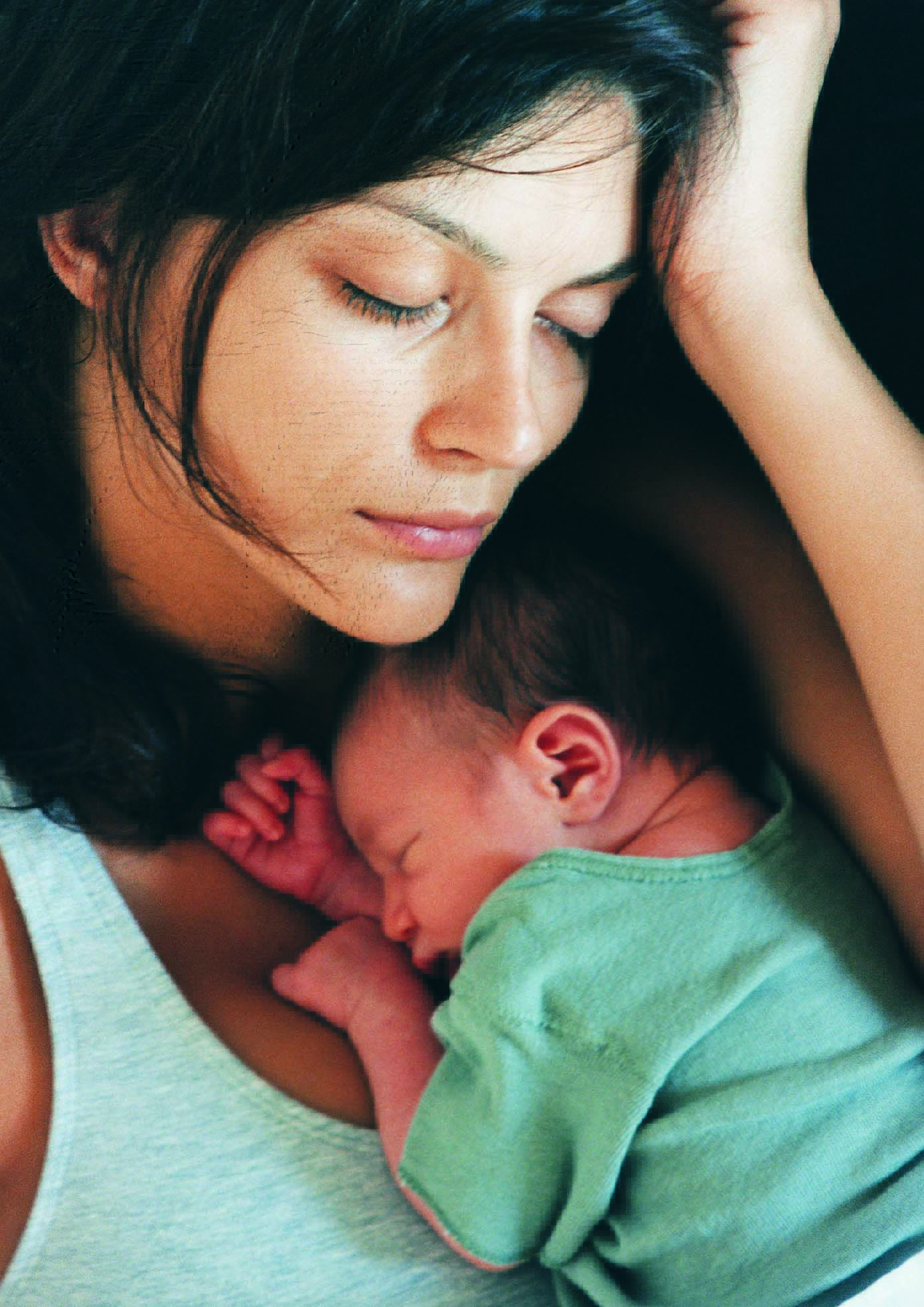 A mother holding her newborn