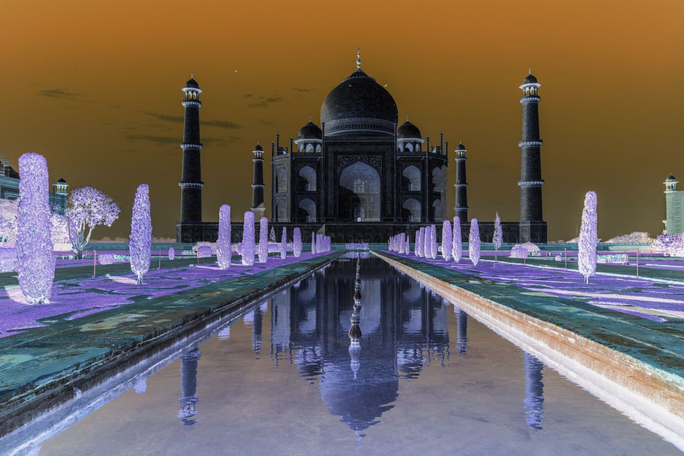 A picture of the Taj Mahal in India appears with the building in dark gray and black, the sky is orange, the small trees lining the rectangular pond that leads to the building are purple, and the sidewalks appear blue-green.  A start timer button appears below the image. once 20 second timer has expired an aferimage of taj mahal picture over a black and white image version same there to be color on with green bushes, yellow grass, red-orange brick sidewalks, blue sky.