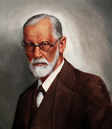 An academic portrait painting of a bearded elderly man in a brown suit and round rimmed spectacles. 