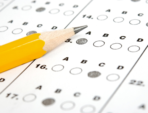 A sharpened pencil on a multiple choice Optical mark recognition (OMR) sheet.