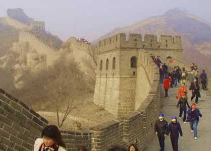 Photo: Great Wall of China, showing higher section off in the distance