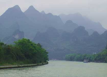 Photo: Li River in China, showing high mountains off in distance