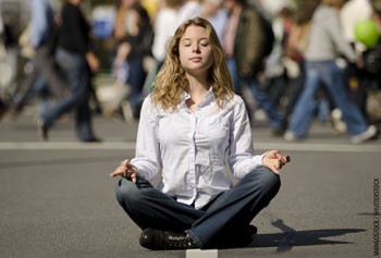 Picture of a young woman meditating
