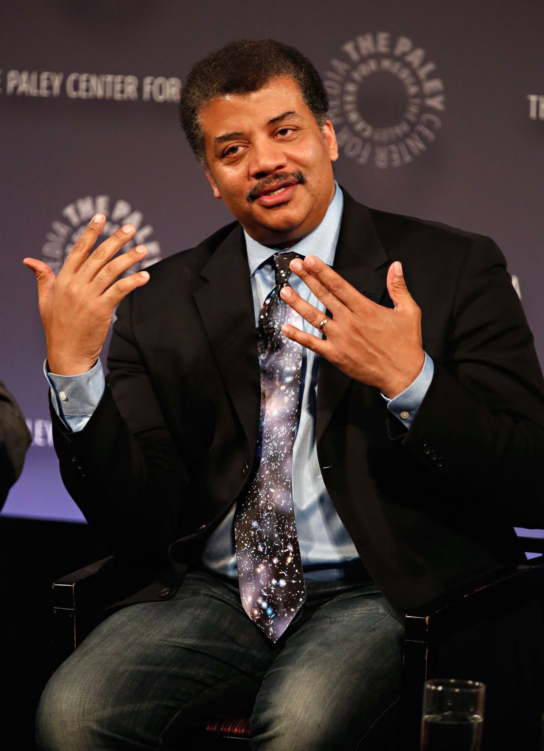 This photo shows Neil DeGrasse Tyson, who, according to some, is the most famous scientist in the United States.