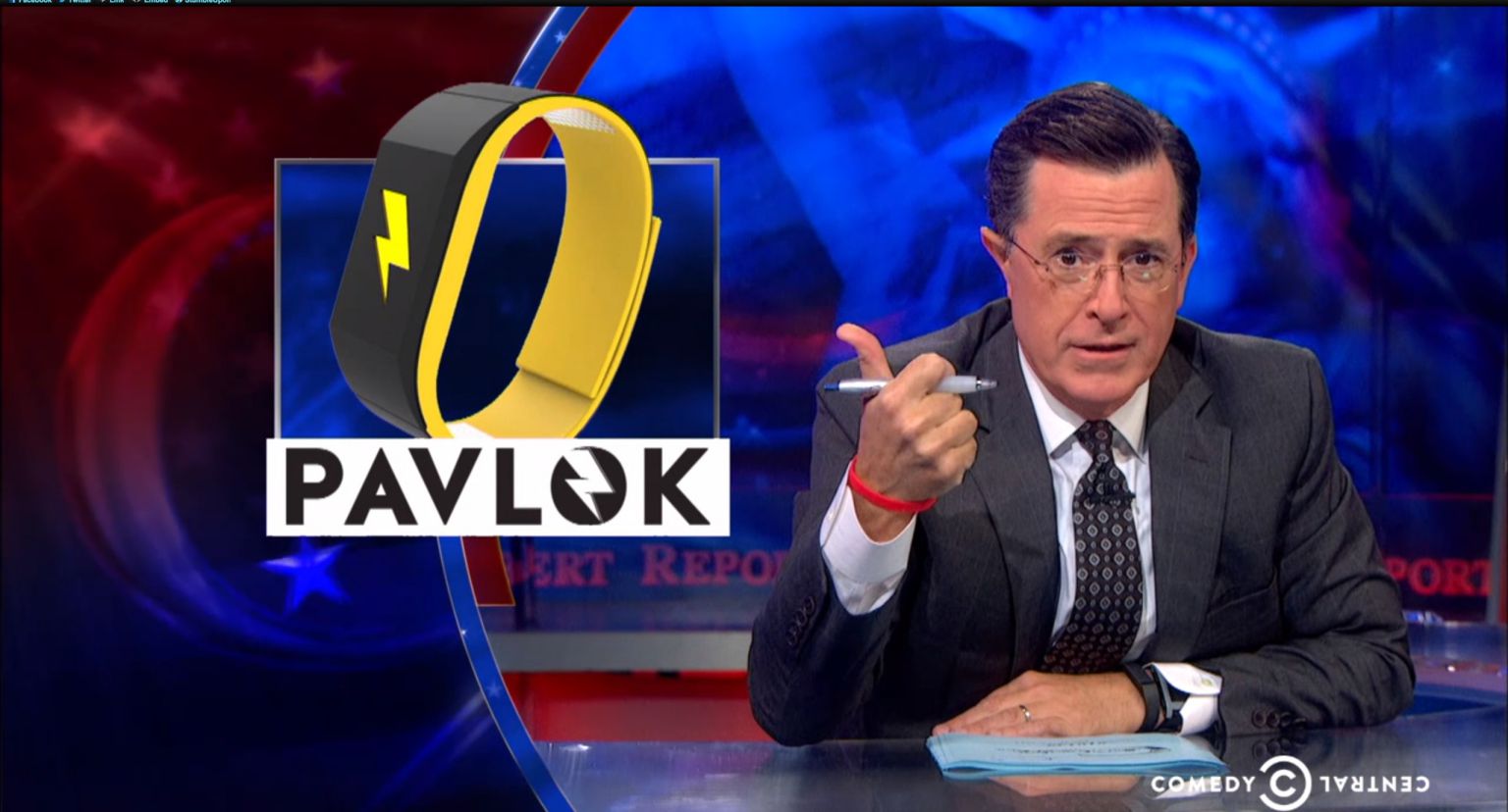 Stephen Colbert talks about the negative reinforcement of a wearable activity tracker on a T V show. 
