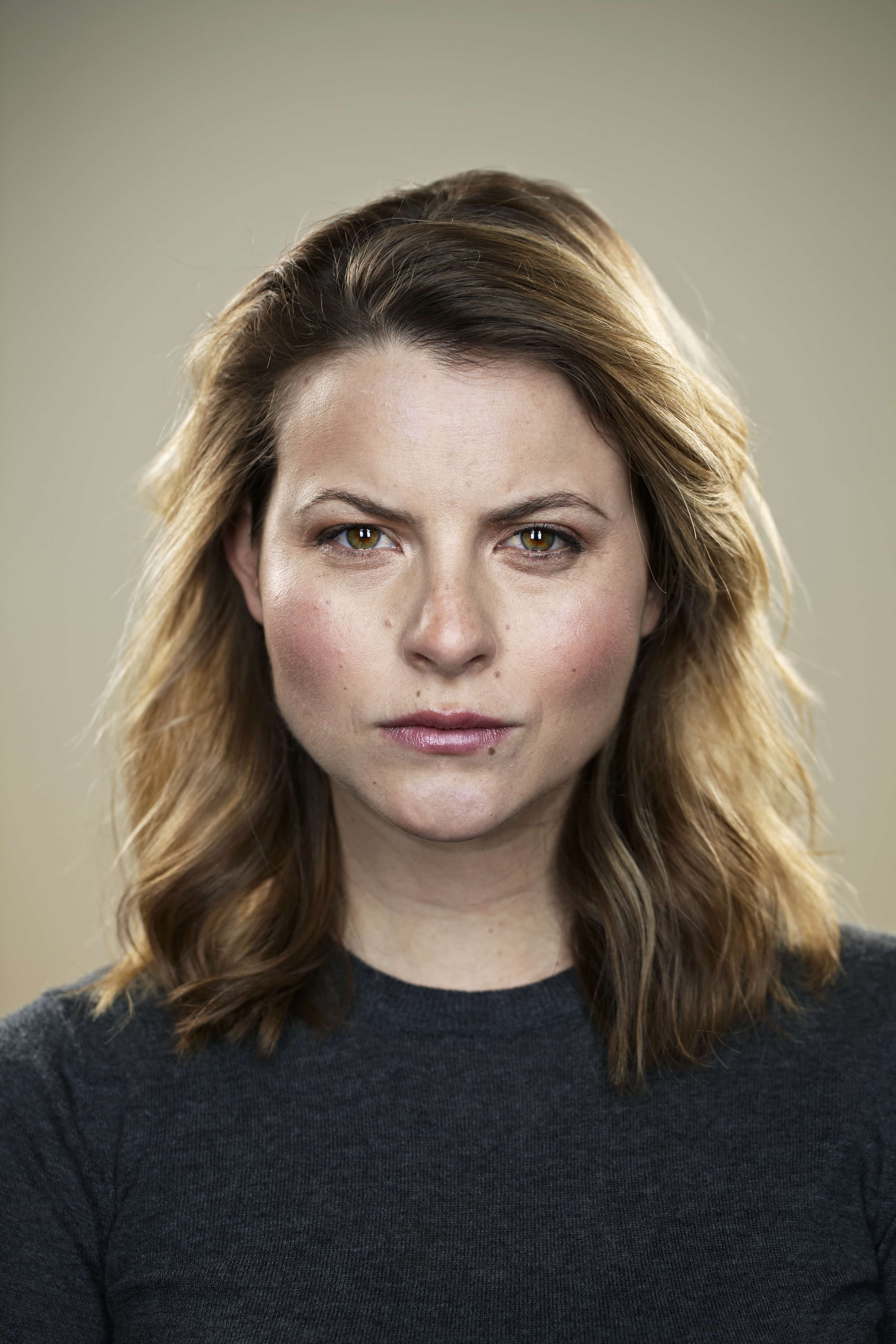 Portrait of a woman looking angry.