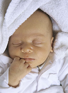 Newborn baby boy (0-3 months) sleeping, closeup