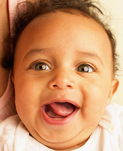 Close-up of a baby smiling