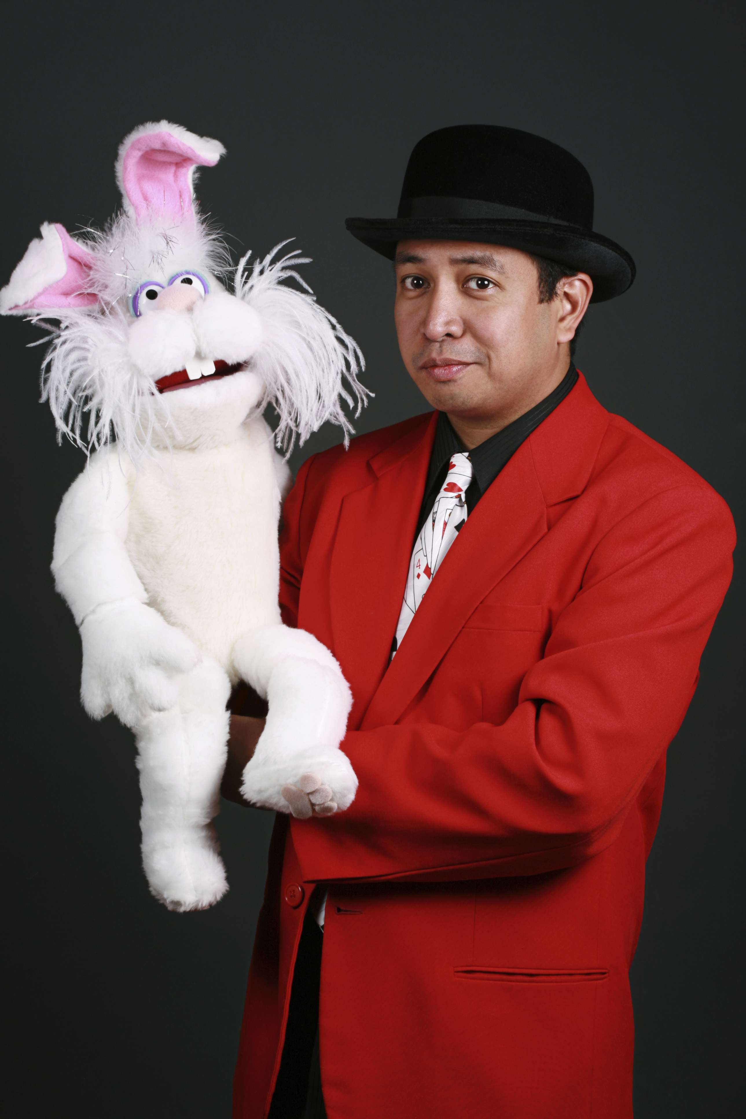 36-year-old hispanic magician with a rabbit