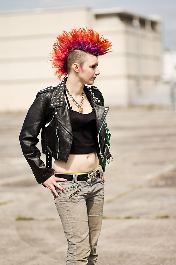 Photo: An individual with a very unusual hairstyle, such as a distinctive Mohawk or spiked style