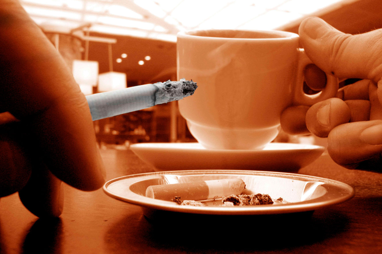 Photo: Coffee cup and cigarette