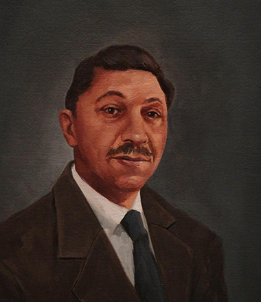 An academic portrait painting of a middle-aged man with dark hair and moustache in a brown suit.