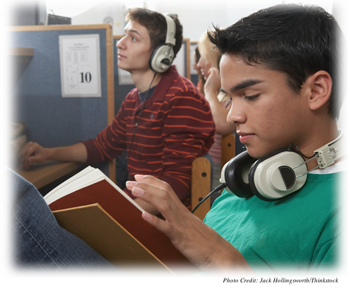 Students in a language lab with headphones