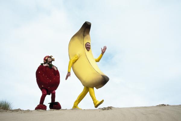 Two people dressed up like fruits. Determining what fruit you are is the result of just one of many “silly” personality tests.